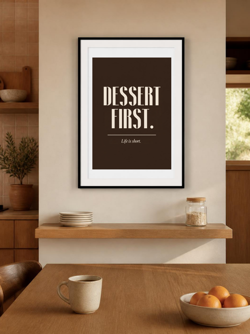 Dessert First kitchen poster in a frame on the wall of a cozy kitchen