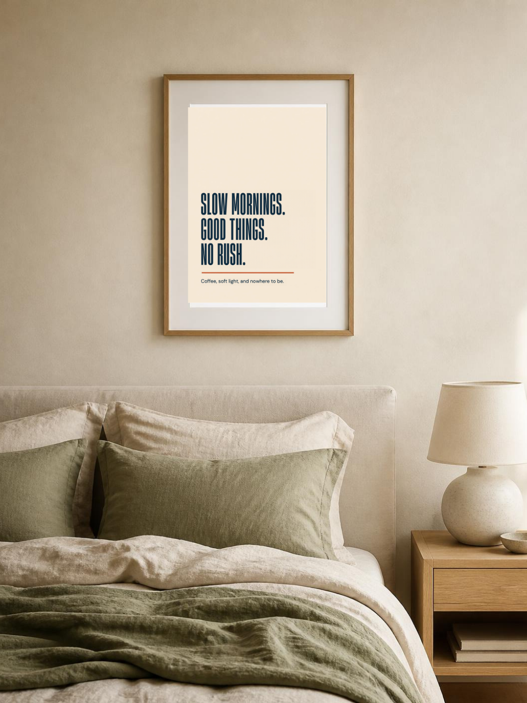 Slow Mornings poster in a frame above a bed – room mockup